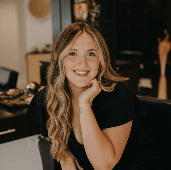 Stasia Drumright sitting in salon studio
